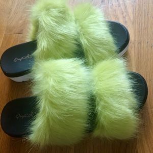 Green furry slippers